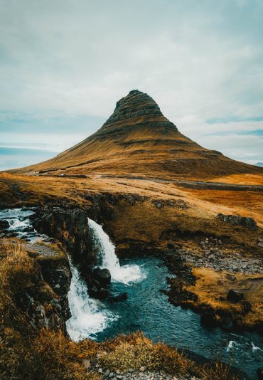 Kirkjufell is a 463 m high hill on the north coast of Iceland's Snæfellsnes peninsula